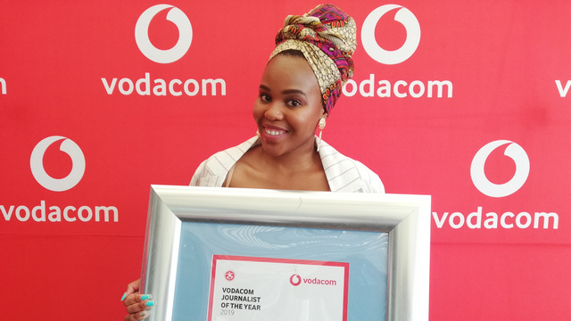 School of Journalism alumna, Andiswa Matikinca, proudly displaying her regional Young Journalist of the Year award. 