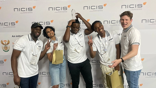 CSyndicate jumping for joy at their 3rd place win!
[L-R] Siyamthanda Hlomendlini, Gabriella Govender, Dr Stones Chindipha, Kenneth Chieza, and Richard Drinkwater.