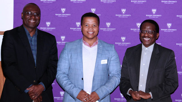 Awardees stand with the VC at the award ceremony